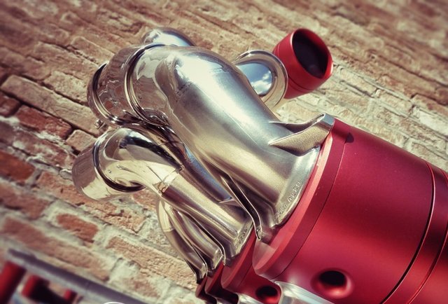 Because music sounds better when pumped through a Formula 1 exhaust