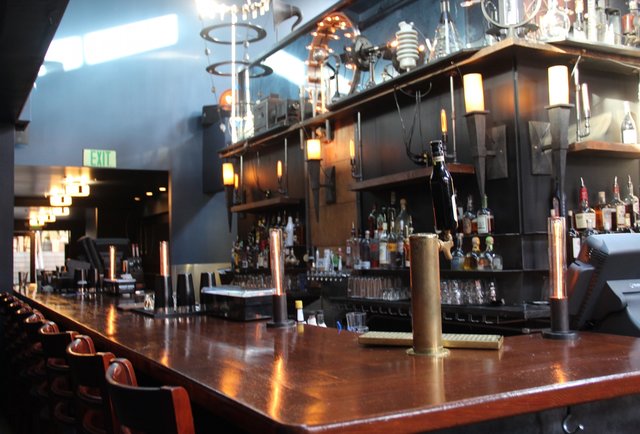 Buckets of crispy wings and bourbon on tap