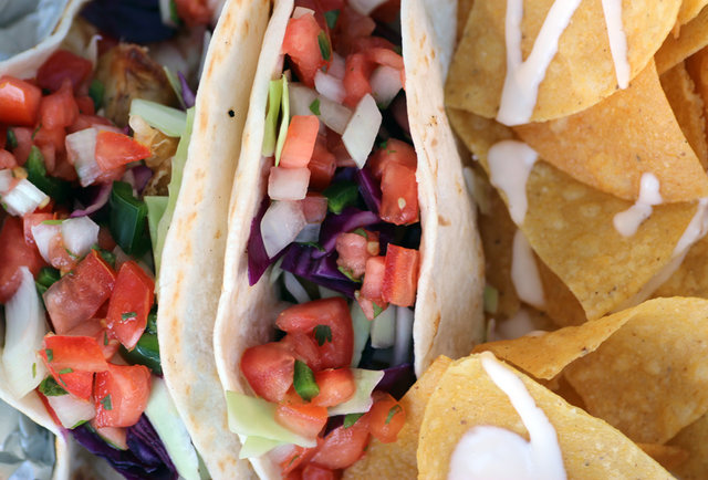 Roll up on fish tacos & fried poblano rings