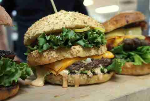 Large melty burger with lettuce
