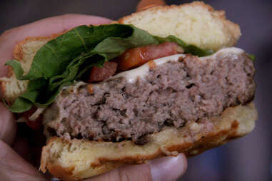 Cut shot of Nick's Roast Beef's Ground Bacon Burger