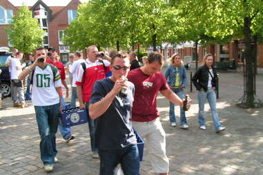men walking with beer