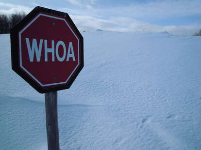 Whoa sign with snow