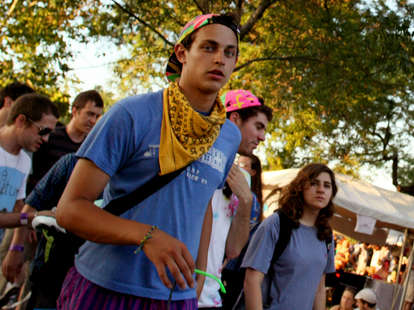 hipster dude with a scarf and colorful hat