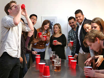 people playing flip cup
