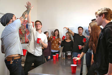 guys playing flip cup