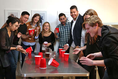 people playing flip cup