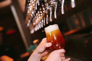 Beer poured from tap