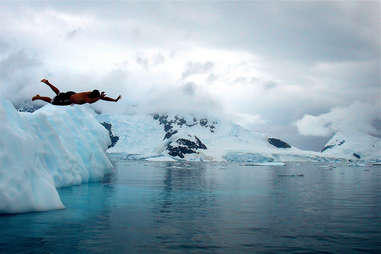 Deception Island, guy jumping in glacier water