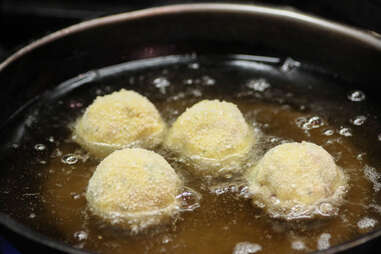 frying mashed potato balls