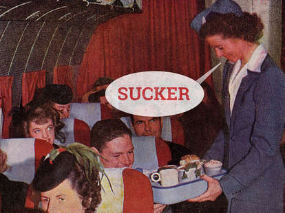 retro airline stewardess serving a meal to suckers