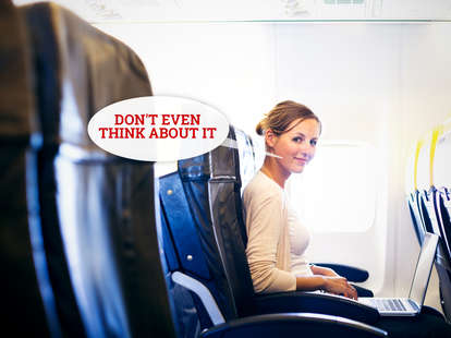 woman in airplane seat