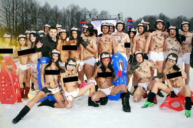 Topless sledding team