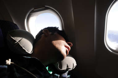 sleeping on plane