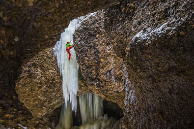 Icicles over rocks