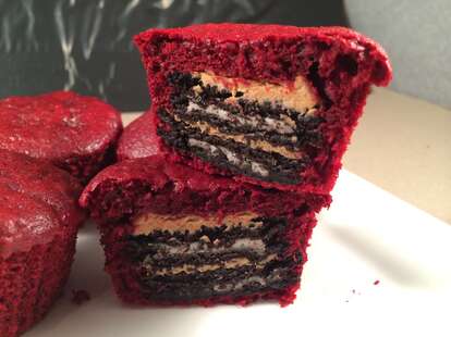 Red velvet cupcakes stuffed with peanut butter and Oreo