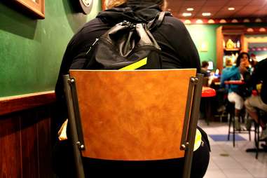 Girl with Livestrong Backpack at Moe’s Tavern at Universal Studios Orlando