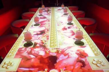 Sublimotion table with projected art