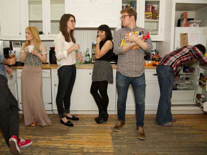 Coworkers in office kitchen