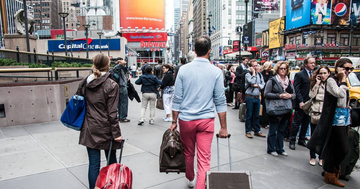 Manhattan New York City With Woman Walking And Carrying Payless