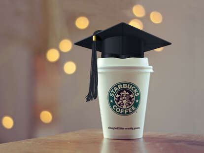Starbucks cup with graduation cap