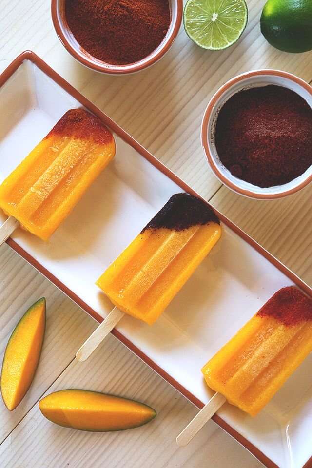 Tequila mango popsicles with chile