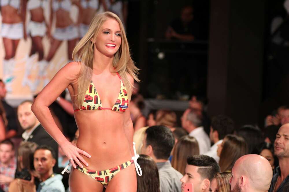 Miami Dolphins Cheerleader Swimsuit Calendar Unveiling - Thrillist Miami