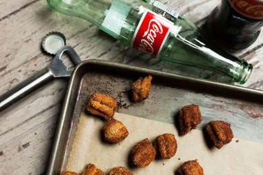 Not just deep fried coke, but Mexican coke, were used to make these mini churros — Thrillist Recipes