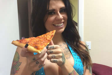 girl eating pizza