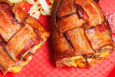 There are, like, four cheeseburgers stuffed inside this bacon-weave burrito.