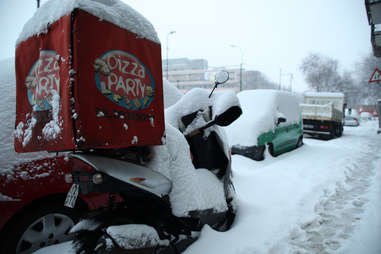 winter pizza delivery scooter