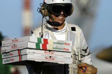 pizza delivery man smiling