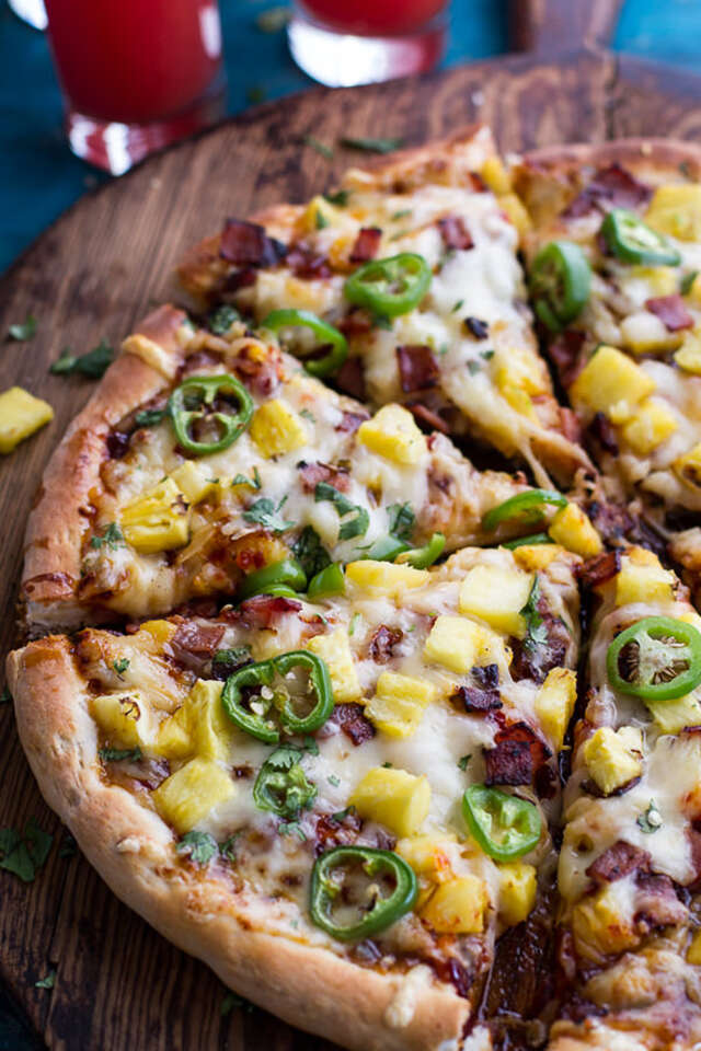 Chipotle BBQ and sweet chili pineapple and jalapeño pizza with bacon