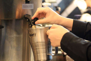 Starbucks steaming milk