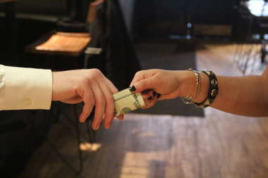 Passing a $20 bill
