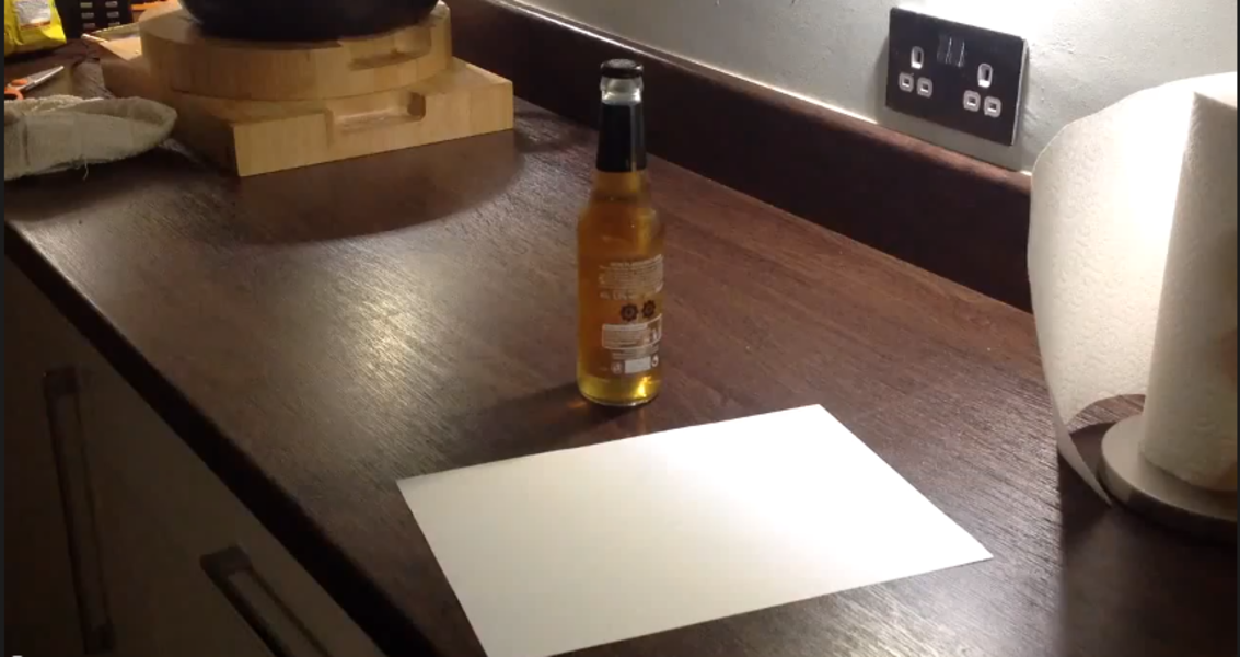 Beer Hack How to Open a Beer Bottle with a Sheet of Paper Thrillist