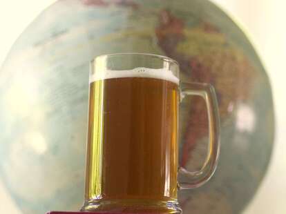 Beer in front of globe