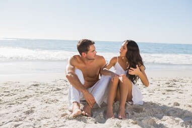 Couple fighting on the beach