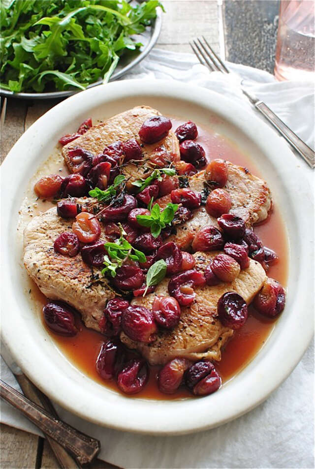Seared pork with roasted grapes