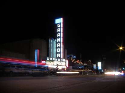 outside the granada theater at night in dallas