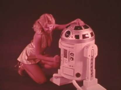 R2D2 knockoff with woman