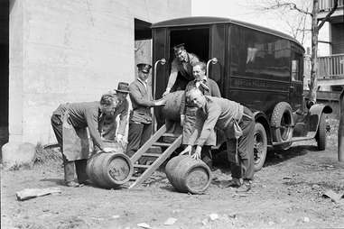 Men loading kegs onto truck