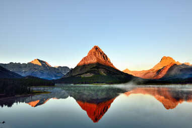 mountains surrounding a lake