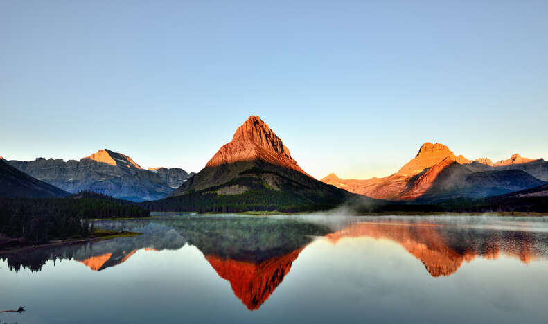 mountains surrounding a lake