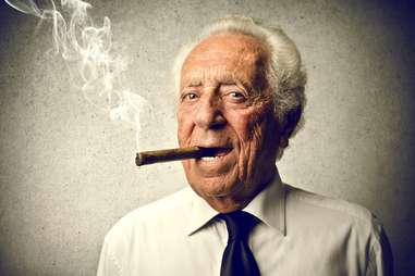 Old man smoking cigar