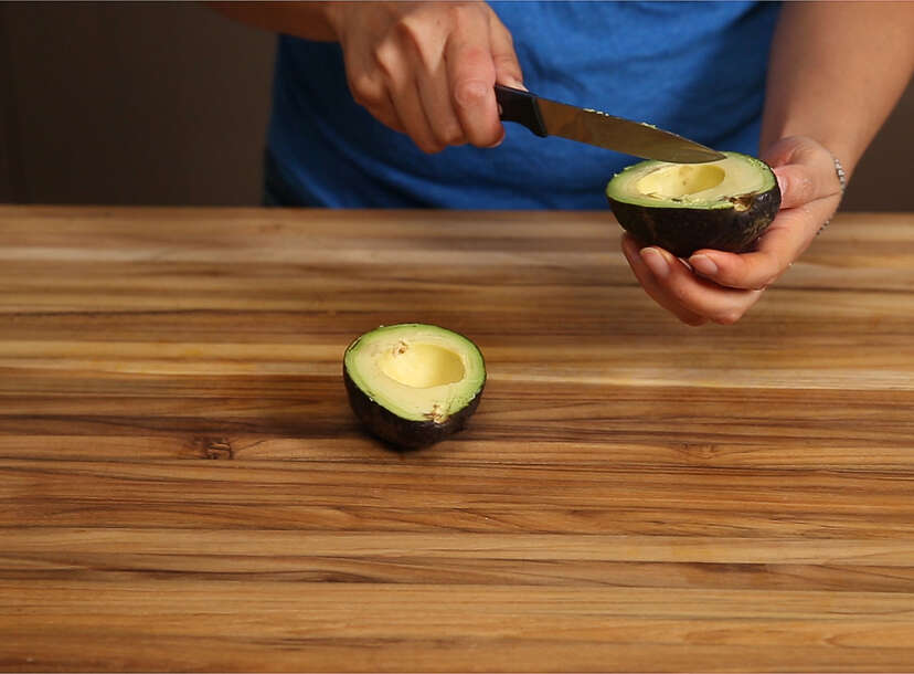 Man Cutting Avocado On A Wooden Cutting Board Personal Perspective Directly  Above View High-Res Stock Photo - Getty Images