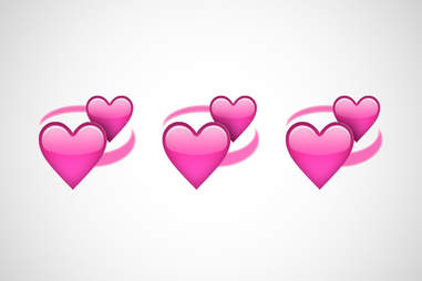 revolving hearts emoji