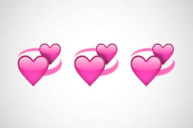 revolving hearts emoji