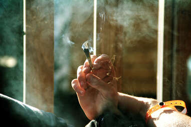 smoking weed, smoking a joint outside