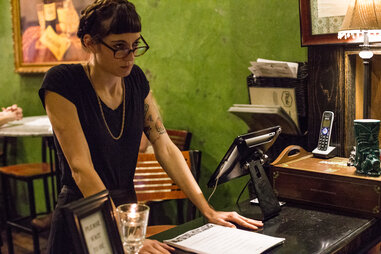 angry server hipster woman looking frustrated Things You Should Never do in a restaurant